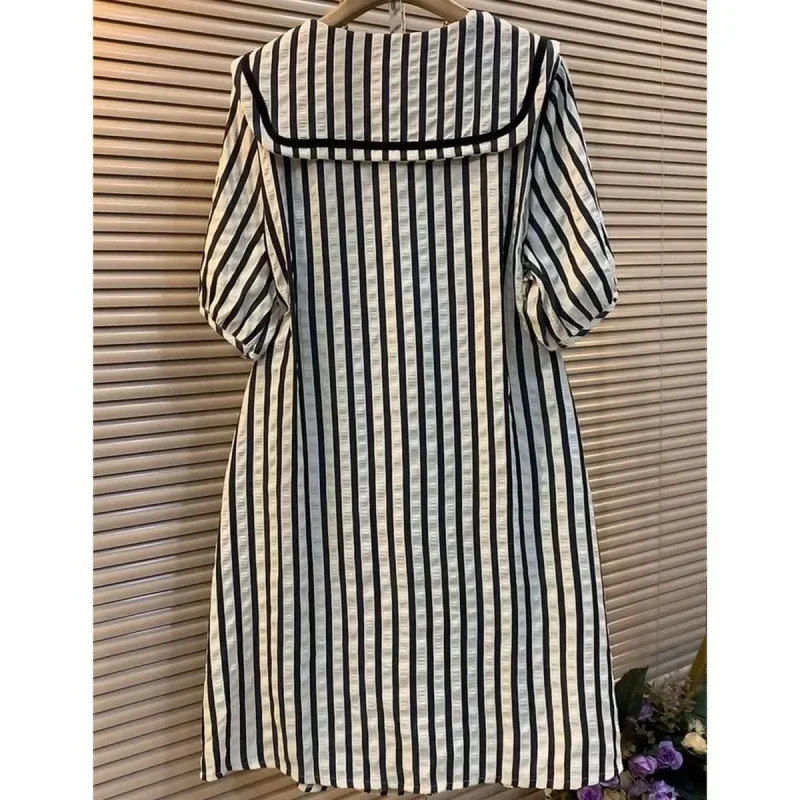 Striped dress female summer 2024 new fashion plus size loose slim temperament design elegant navy collar casual Joker skirt.