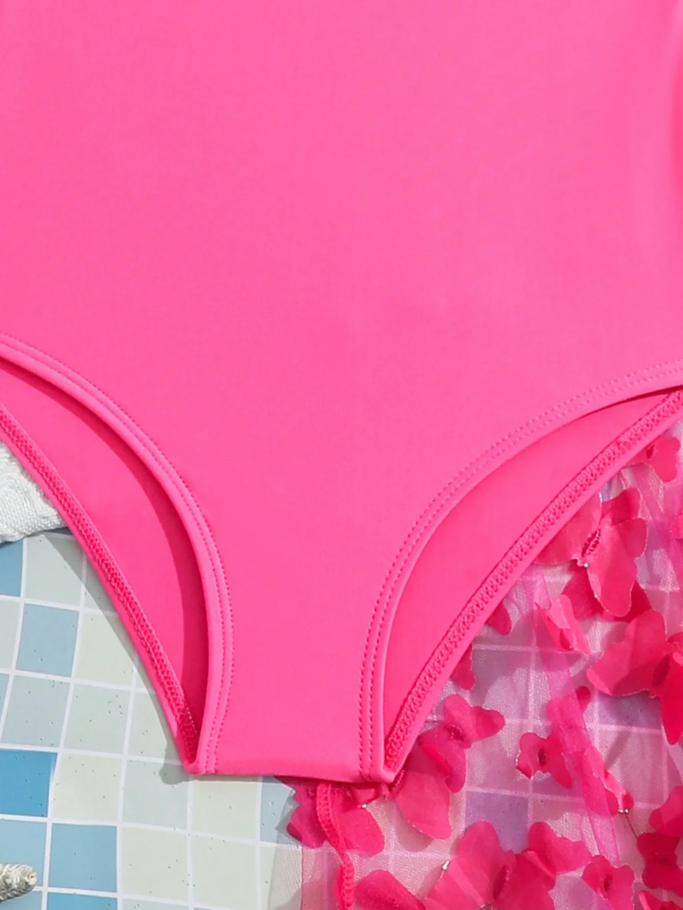 

Vibrant Pink Solid One-Piece Bathing Suit Paired With 3D Floral Mesh Cover-Up Skirt