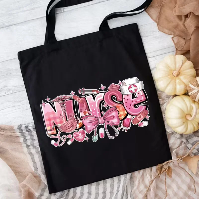 Pink Nurse Canvas Tote Bag "NURSE" Letter Print with Stethoscope Syringe Nurse Cap Mask Pink Bow Pills Bandage Sparkle Decor
