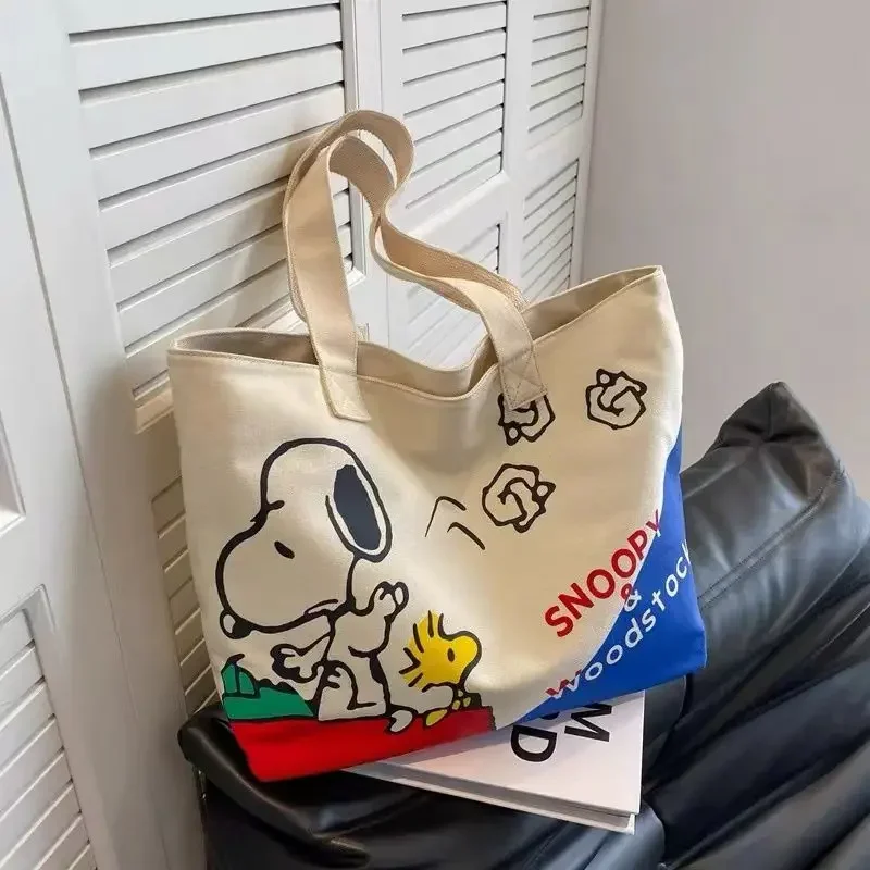 Snoopy Girl Neue niedliche Cartoon-Mode, vielseitig einsetzbar, lässig, für Reisen, leicht, große Kapazität, Aufbewahrung, tragbare Umhängetasche aus Segeltuch – Detail 16