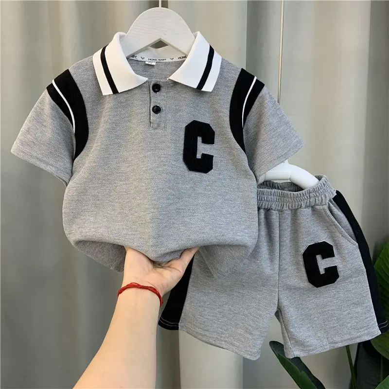 Conjunto de ropa para niños, camiseta Polo y pantalones cortos para bebés, conjunto de dos piezas de manga corta, verano, 2023