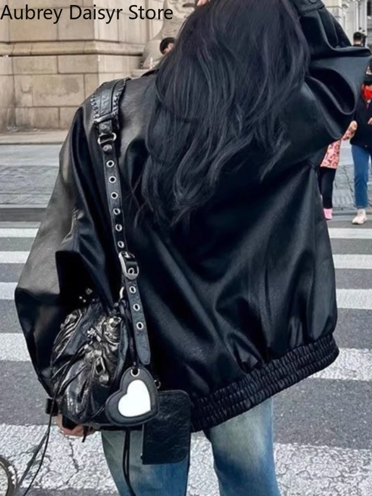 สีดําหลวมซิปเสื้อหนังยาวผู้หญิง Retro Casual Punk แจ็คเก็ตหนังเกาหลี High Street Moto Biker แจ็คเก็ตหนัง 2025
