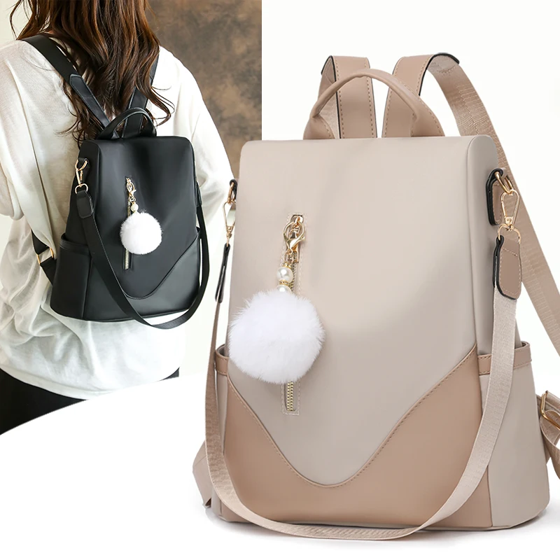 

New Women High-capacity Nylon Backpacks Fashion Tote Bag with Pom Pom Decor Anti-Theft Zipper Casual Travel School Bag for Girls