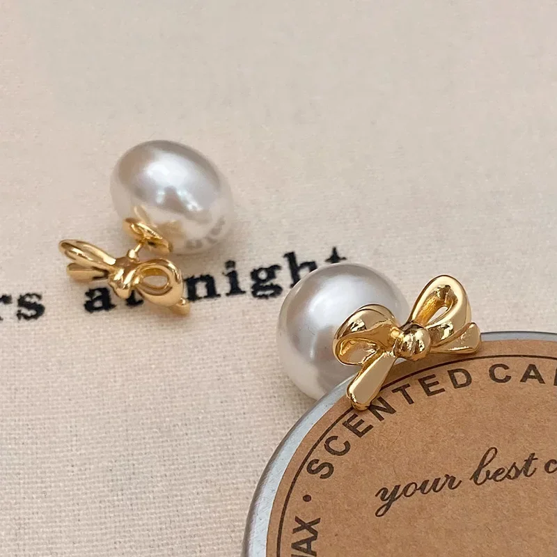 

Real 925 Sterling Silver Pearl Hollow Bowknot Stud Earrings for Women Cute Fine Jewelry Minimalist Light Luxury Accessories
