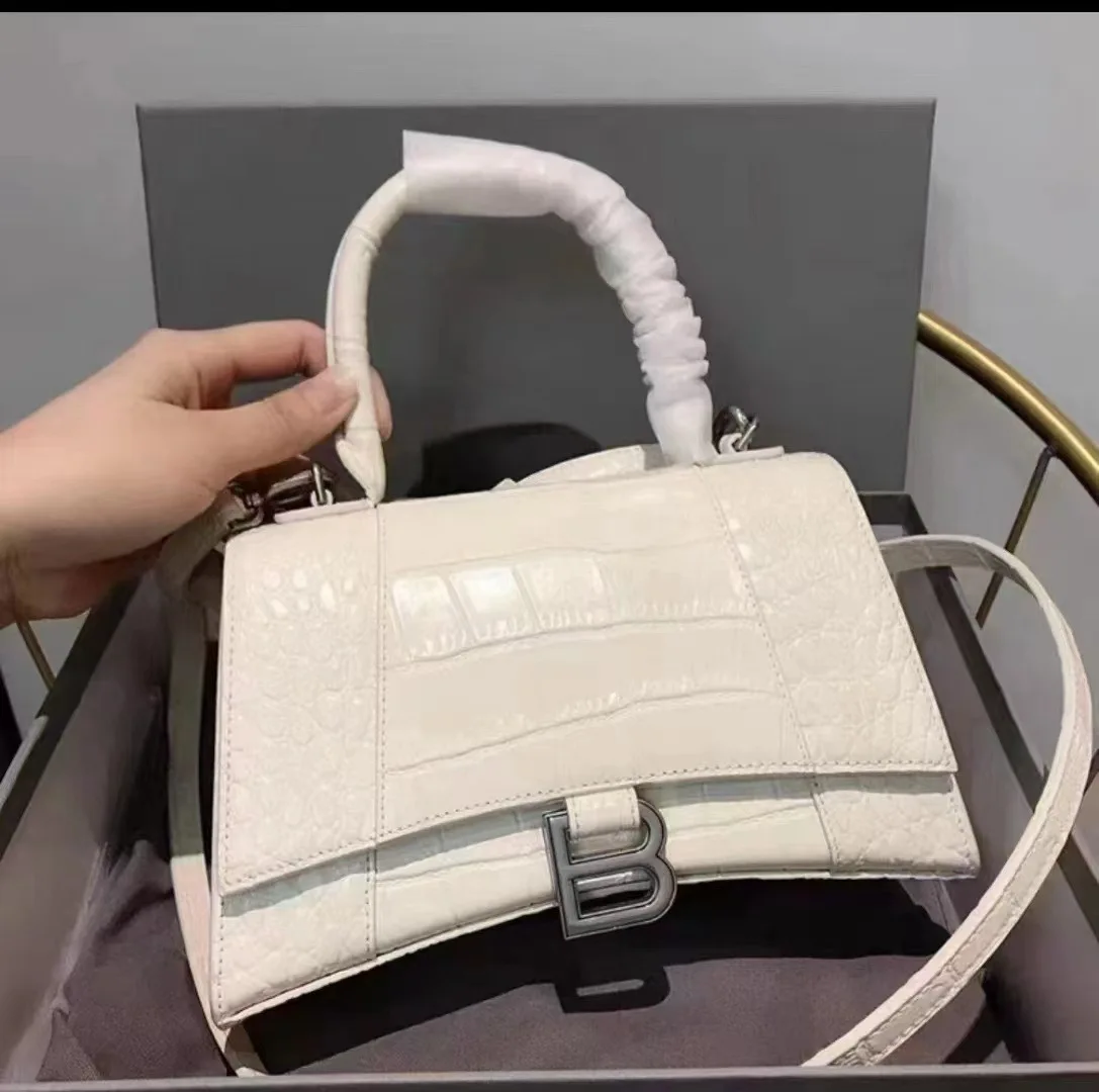 Bolsos populares para mujer en 2023, nuevo bolso de reloj de arena de nicho francés de alta gama, bolso de hombro tipo bandolera de mano popular