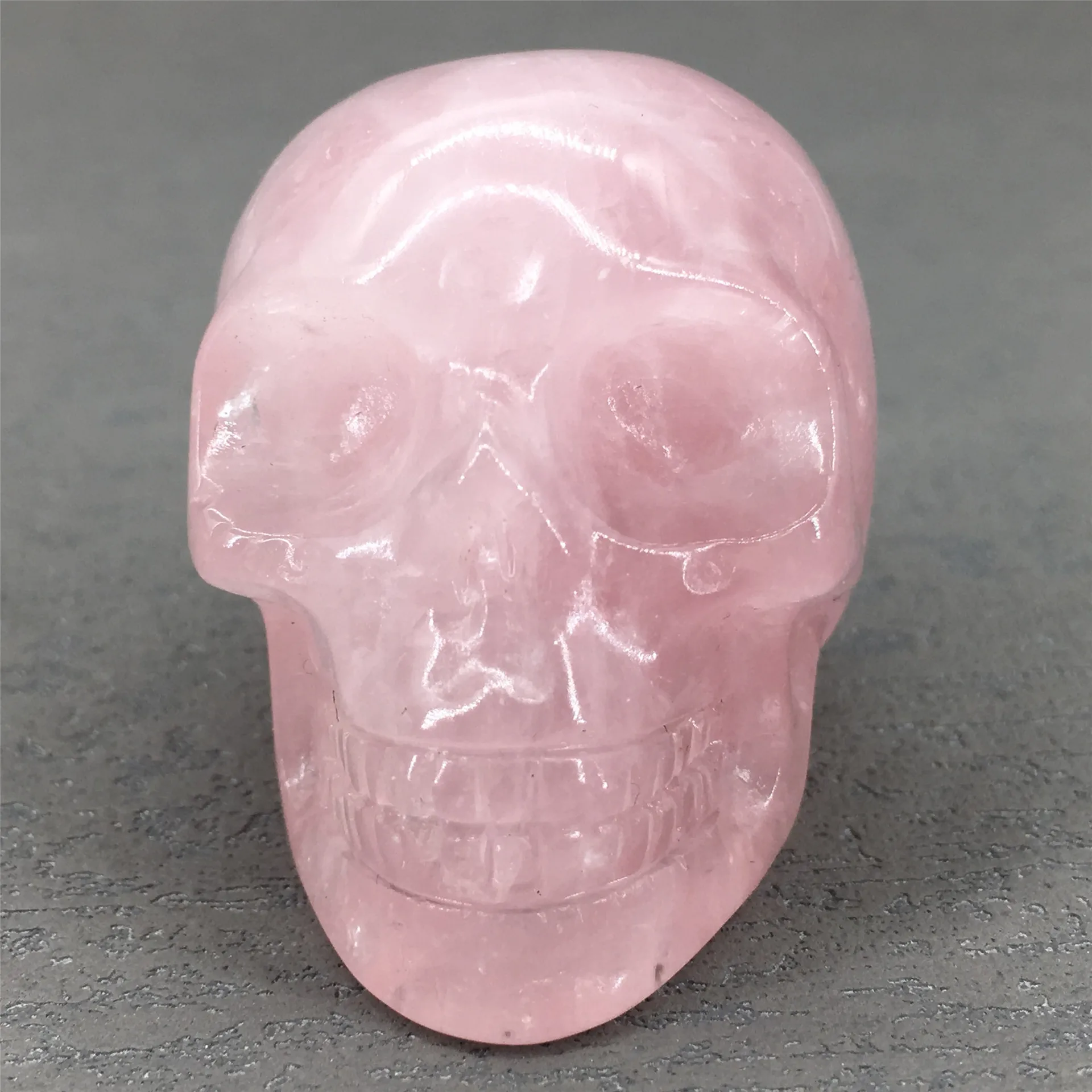 

Natural stone crystal carved 2-inch pink crystal skull figurine collection handicraft gift small ornaments