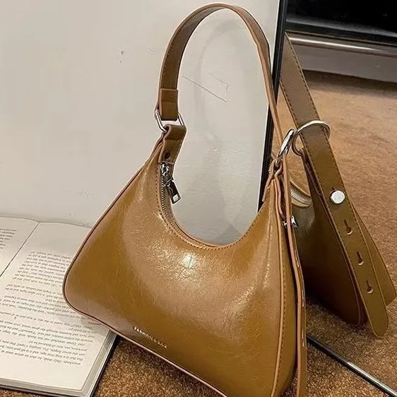 

2025 женская роскошная сумка подмышки, модная сумка через плечо, модный нишевый дизайн, универсальная сумка через плечо, вирусная стильная сумка