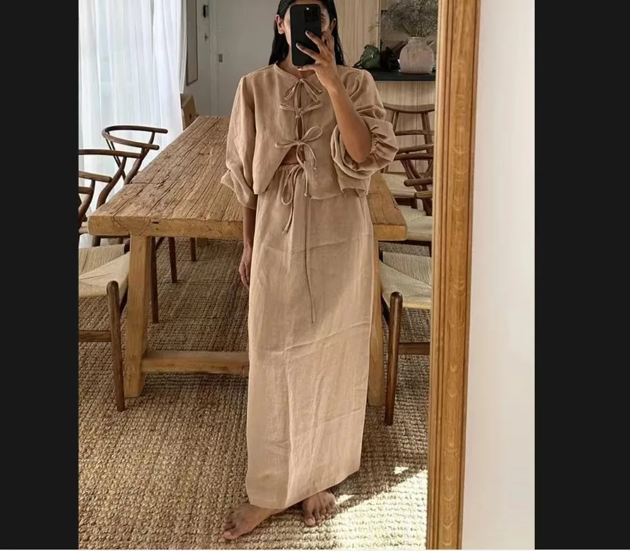 

SKMY New 2025 Spring And Summer Hollow Out Lace-Up Long Sleeve Round Neck Tops Brown Long Skirts Casual Women Two Piece Sets