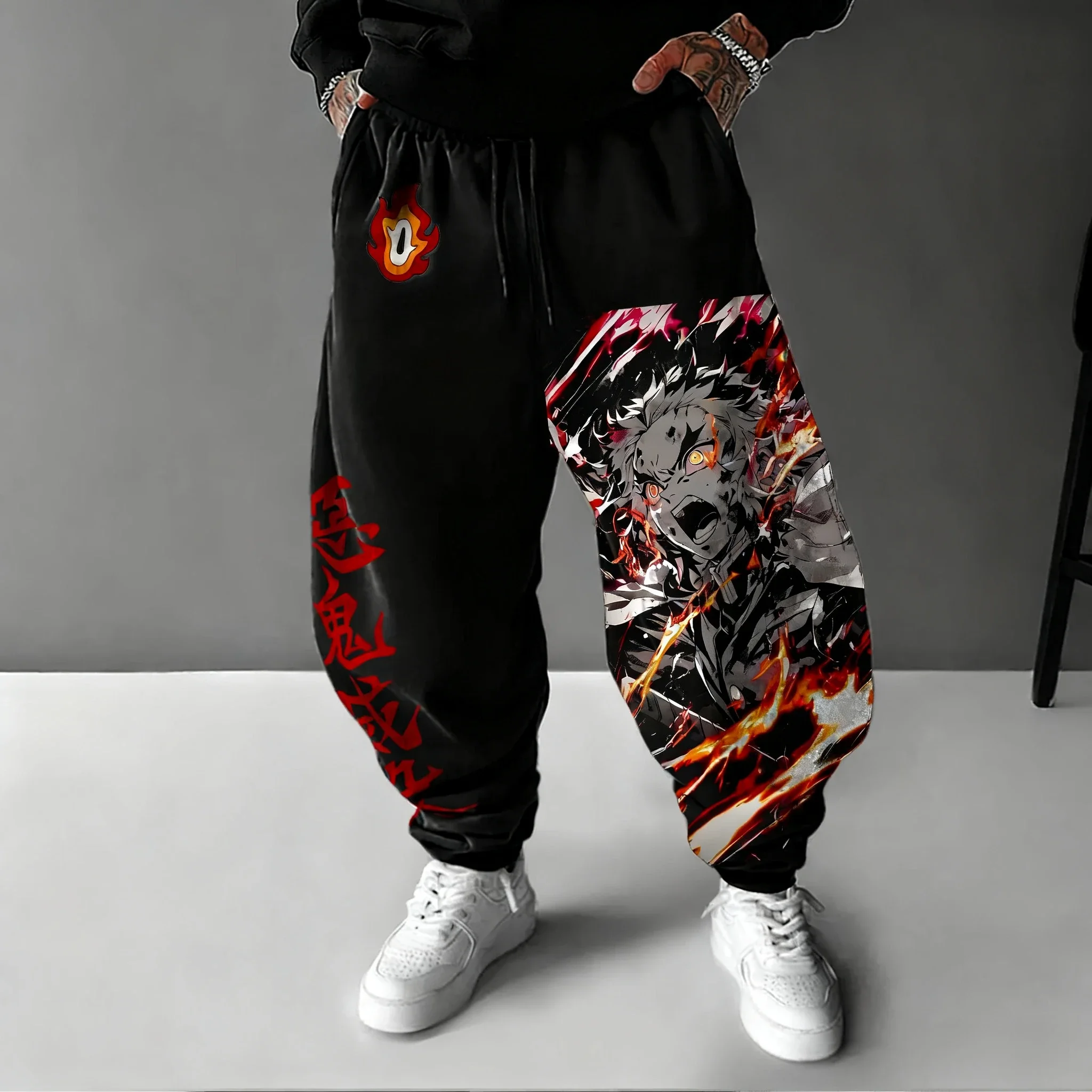 Demon Slayer Anime hombre 2026 Otoño/Invierno pantalones deportivos Rengoku Kyoujurou estampado dibujado a mano deportes Casual moda pantalones ajustados