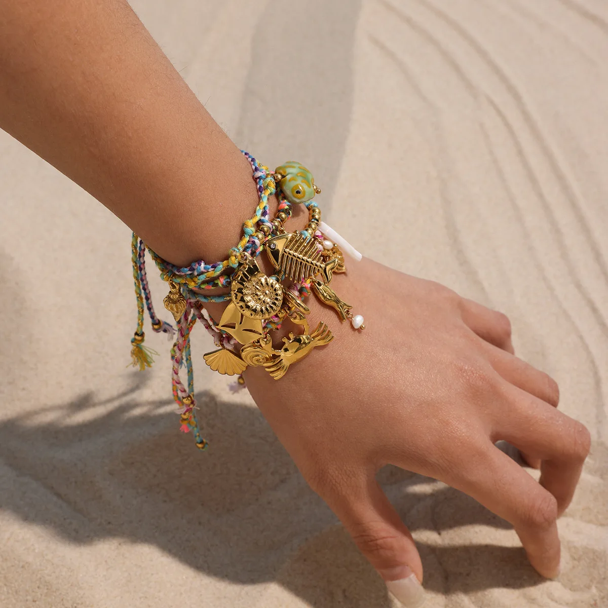 

CARLIDANA Gold Plated Stainless Steel Summer Beaded Rope Bracelet Colorful String Ocean Steel Charm for Beach Vacation Jewelry