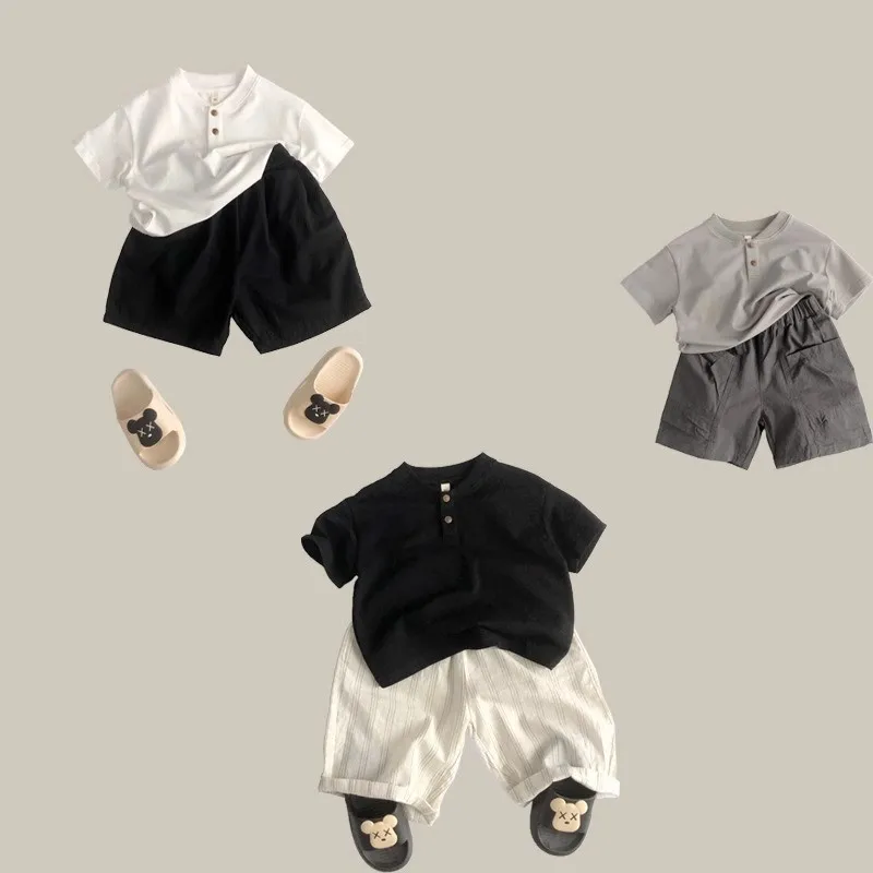 Summer children's T-shirt new Korean version handsome boy and girl baby casual solid color short sleeved T-shirt polo shirt