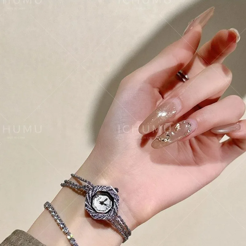 Elegant women's watch simple casual fashion light luxury niche high sense exquisite retro student waterproof quartz watch new