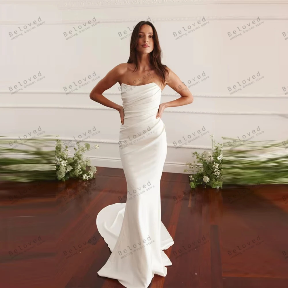 

Простые свадебные платья Атласные свадебные платья без рукавов Халаты с открытой спиной Сексуальная без бретелек Русалка Изящные платья Vestidos De Novia по индивидуальному заказу