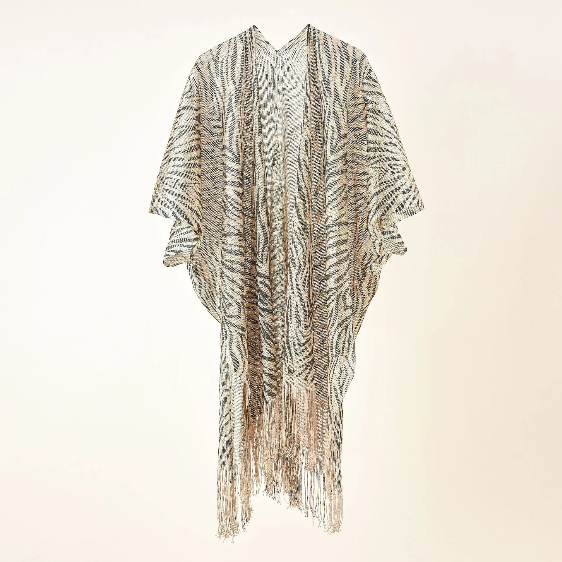 A loose fringed mid-length cardigan for women