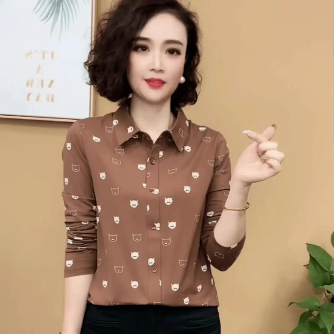 Camicetta da donna a maniche lunghe dimagrante a righe sottili versatili ed eleganti con colletto polo primaverile