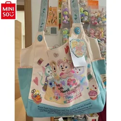 MINISO 2024 New Cartoon Duffy Bear Printed Student Shoulder Portable Canvas Bag is simple, sweet, and versatile.