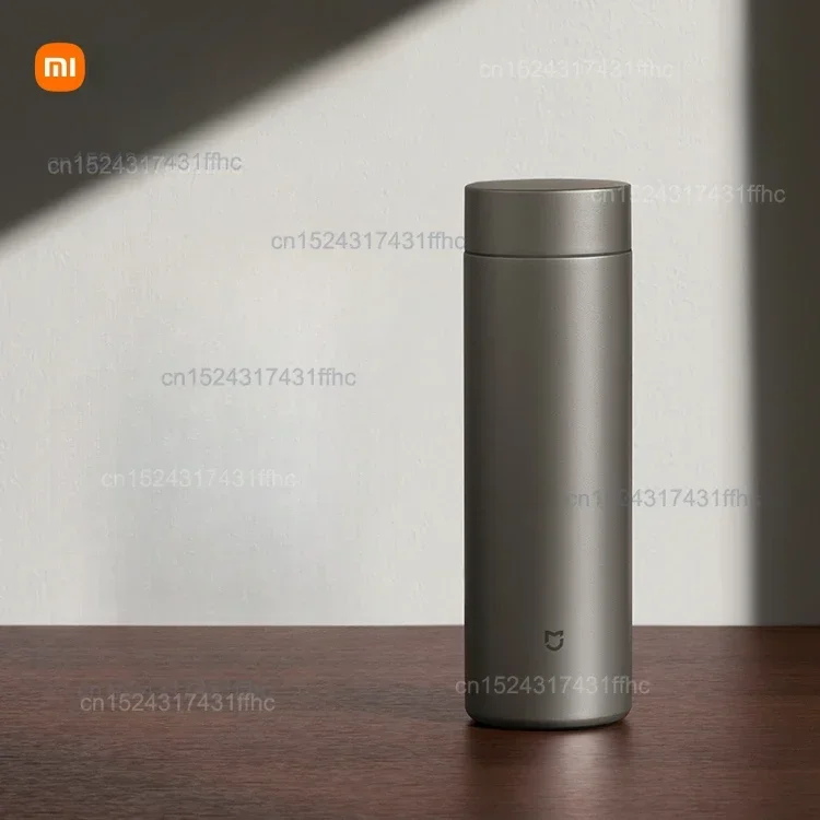 Original xiaomi mijia 99% pure titanium thermos cup portable car men's and women's water cup tea separation long-term cold