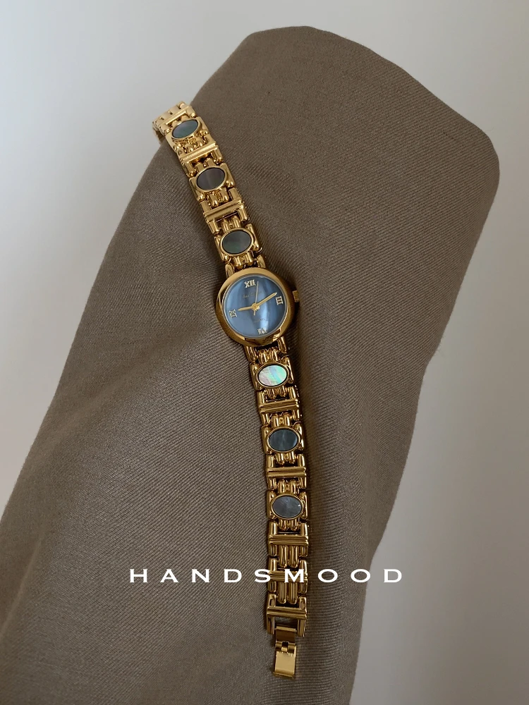 

A stylish and sophisticated roundquartz watch for womenperfect as a birthday gifta high-end women's wristwatch and an accessory.