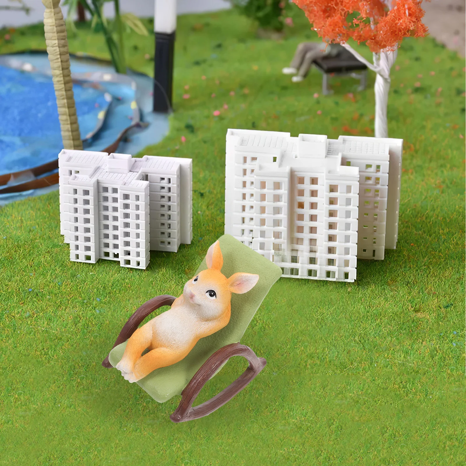 

Outdoor Garden Rabbit Decoration Resin Rocking Chair Design Lawn Ornament for Yard Patio Balcony Sitting Bunny Statue Garden