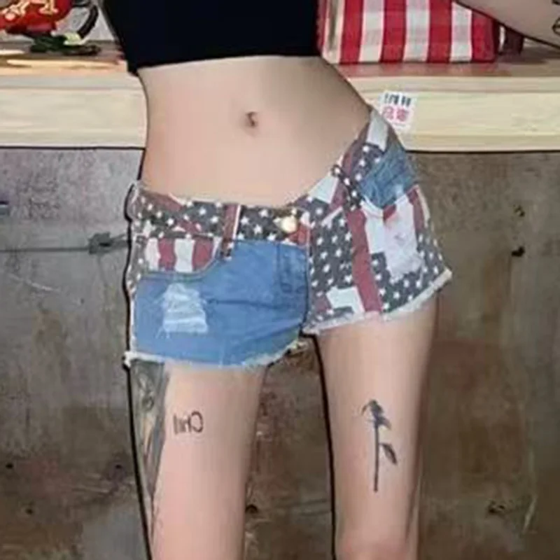 388 # Nuovi pantaloncini di jeans versatili dimagranti a vita bassa da donna con foro strappato che abbracciano i fianchi sexy europei e americani