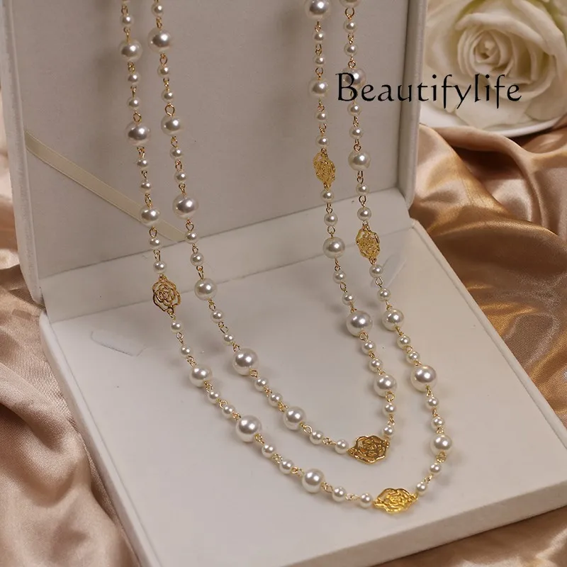 Temperament long pearl necklace women's fashion multi-layer hollow rose sweater chain