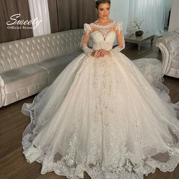 หรูหราชุดแต่งงานปักลูกไม้สุทธิประดับด้วยลูกปัดกับชุดบอลเจ้าหญิง O-คอแขนยาว Vestido De Novia ที่กําหนดเอง Chic