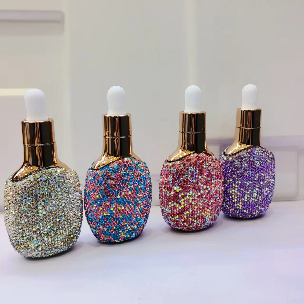 

Leak-Proof Refillable Essential Oil Bottle with Rhinestone Decorated Glass Dropper Dispenser Cosmetic Liquid Container