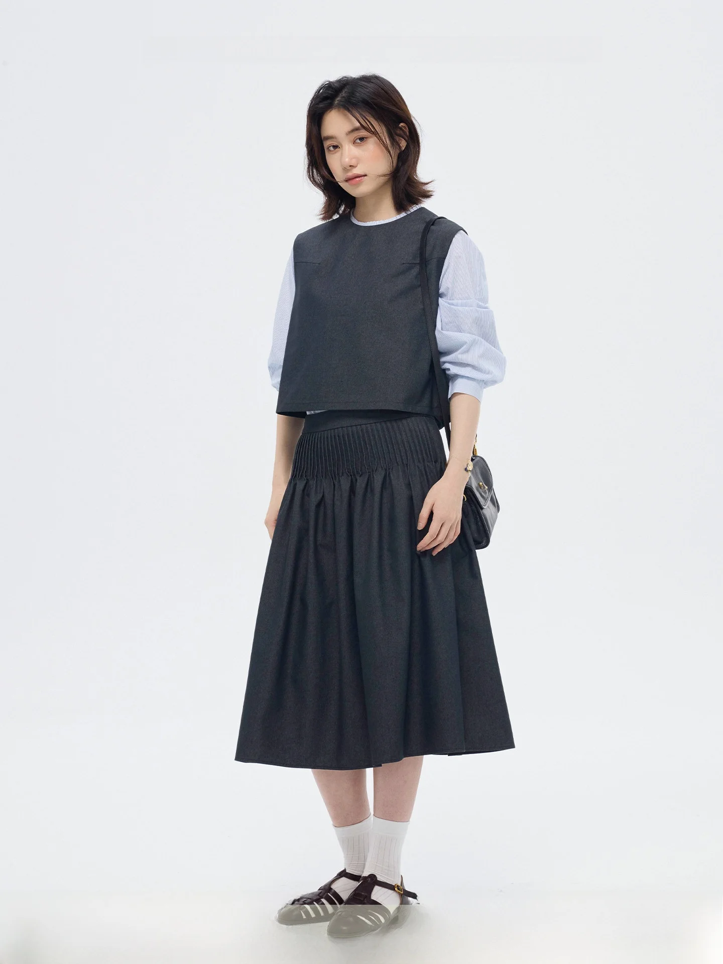 

Винтажный синий джинсовый комплект Sli: жилет и юбка для женщин, модный повседневный стиль, весенний сезон, стандартная длина, с вырезами для рук