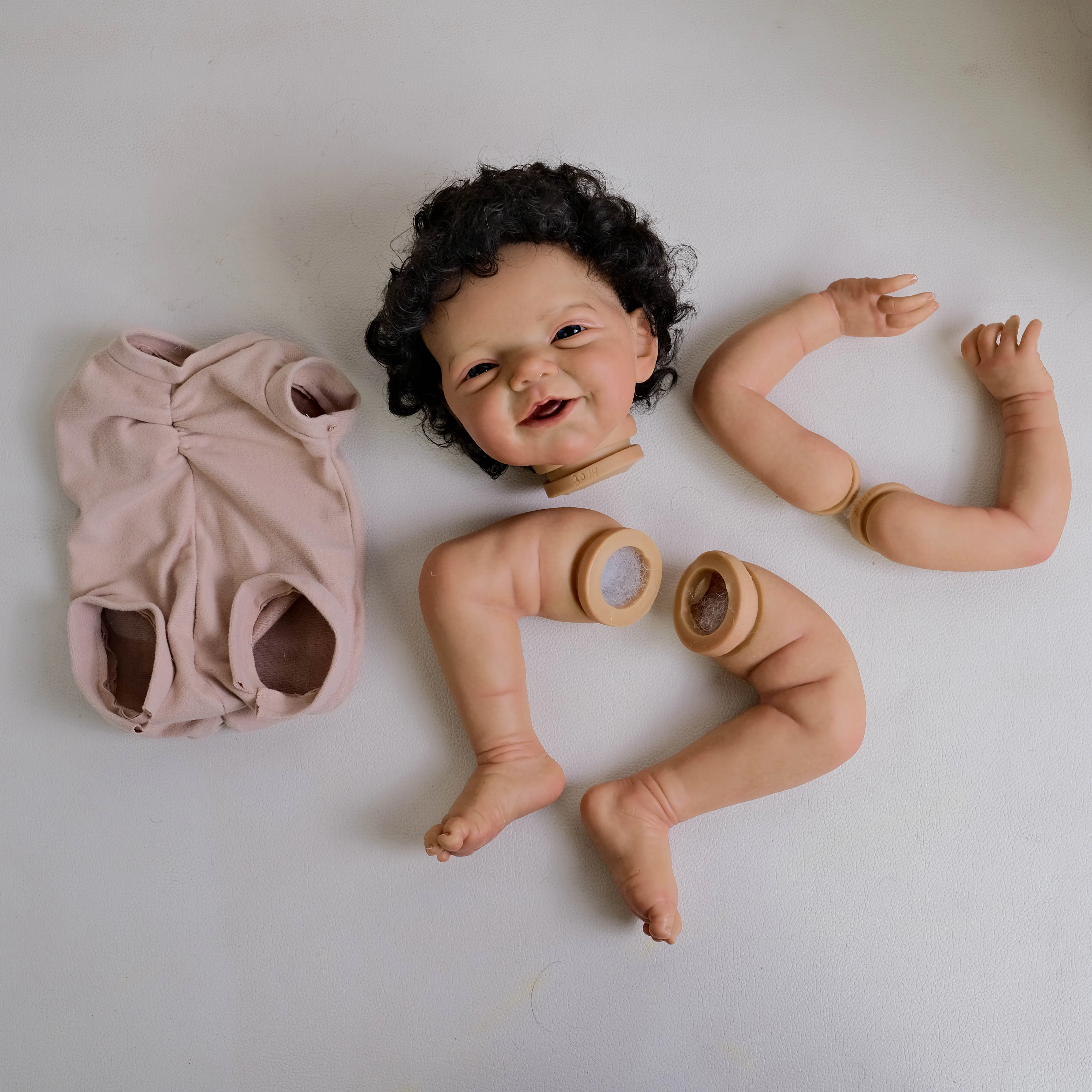 NPK 19inch Charlie Unfinished Painted Reborn Doll Kit Dark Brown Skin DIY Cute Doll Parts for Collectors And Craftsmen
