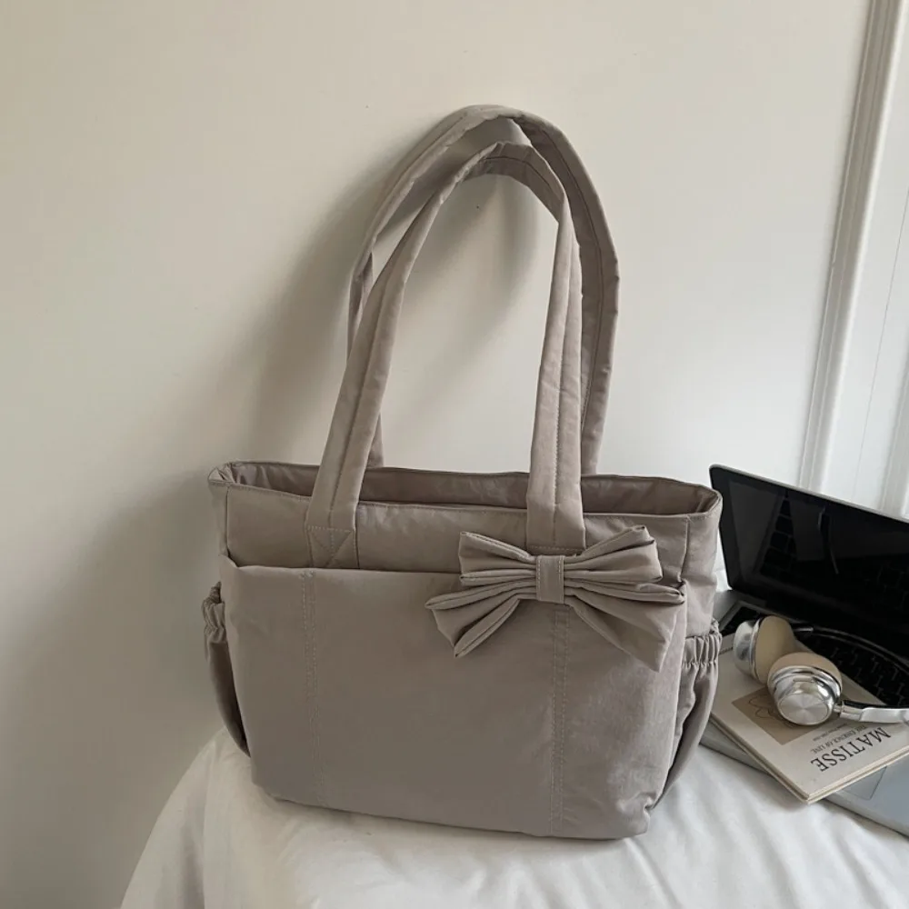 

Temperament Korean Style Bow Tote Bag Large Capacity Simple Cotton Padded Shoulder Bag Fashion Solid Color Nylon Handbag Ladies