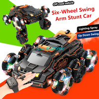 Watch Sensing Six-Wheel Swing Arm Spray Remote Control Stunt Car 2.4G 4WD All Terrain Lighting Sound Dual Side RC Car Model Toy