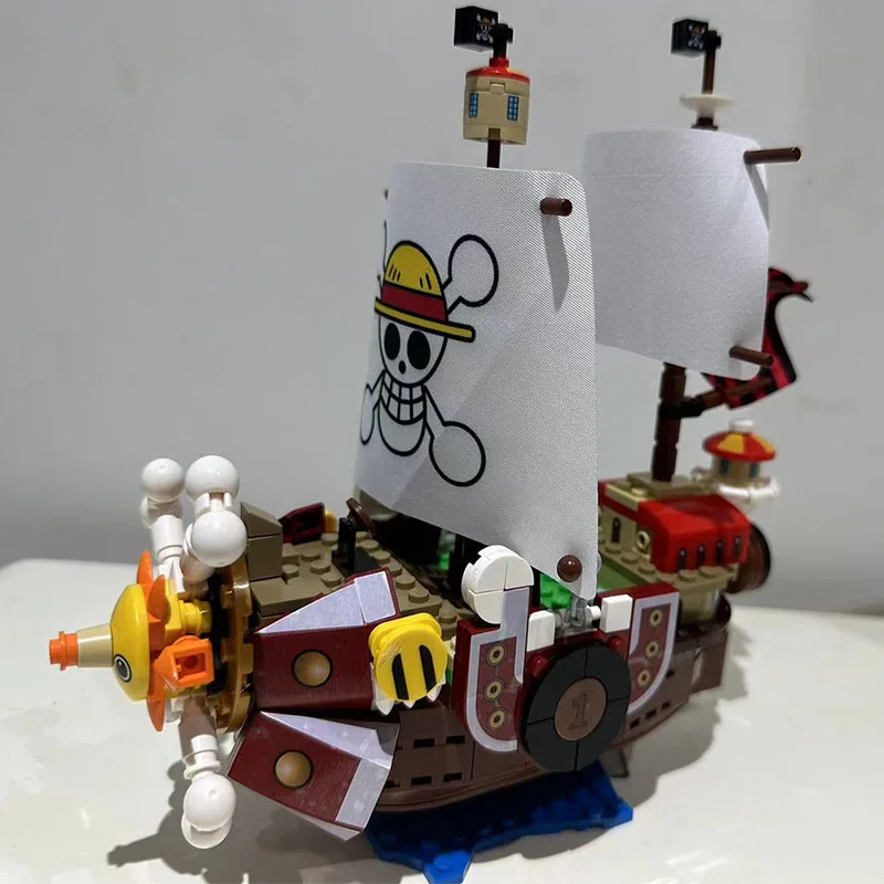 

One Piece Luffy Zoro Nami Buliding Blocks Thousand Sunny Pirate Ship Educational Toy Kids Bricks Action Children Birthday Gift