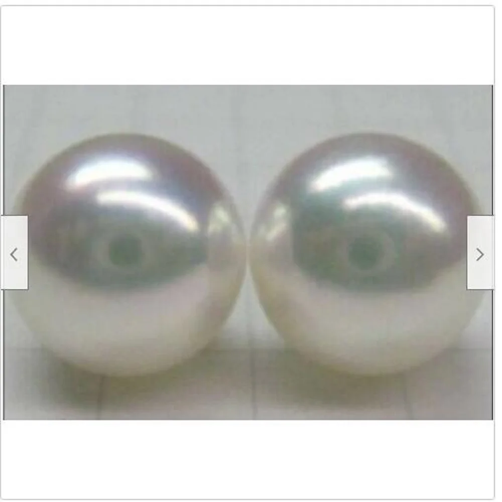 

A pair of huge perfect studs Nanhai 12-13MM white loose Pearl