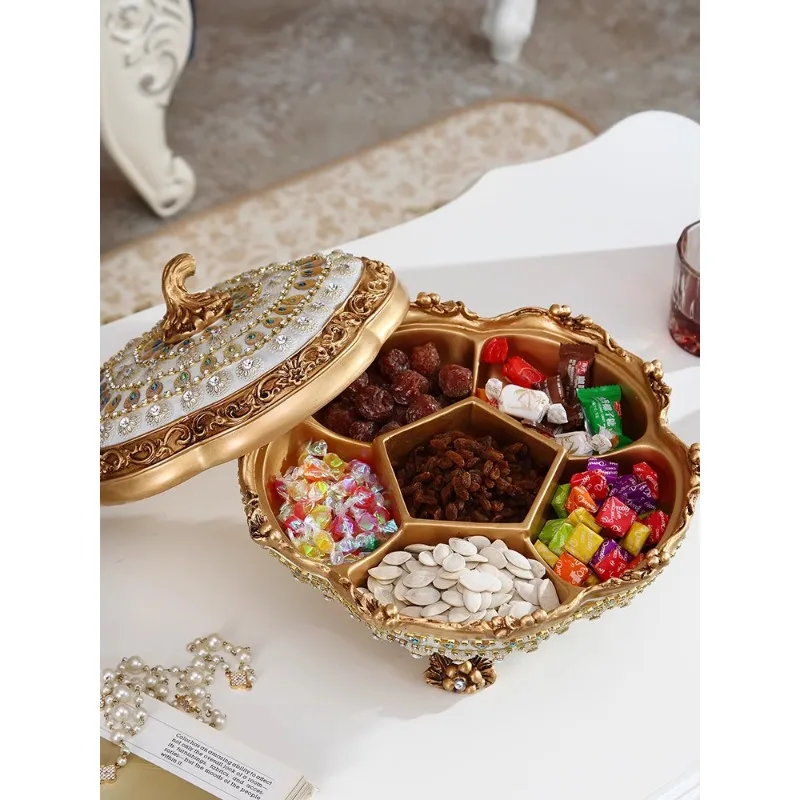 European rotating dried fruit plate, household living room coffee table, luxury ornament, high-end covered melon seed plate, can