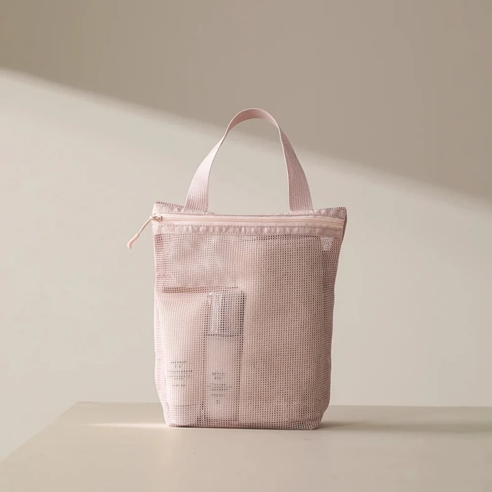 Przenośna kosmetyczka z wygodnym uchwytem, duża pojemność, siatkowa torba do przechowywania kosmetyków, kosmetyczka na podróże służbowe i wycieczki.