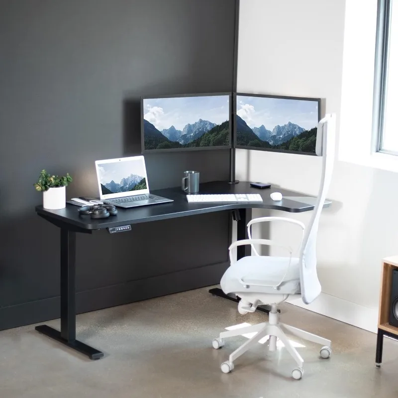 L-Shaped Standing Desk Workstation Memory Controller Height Adjustment Reversible Black Top Black Frame Put on The Study Room