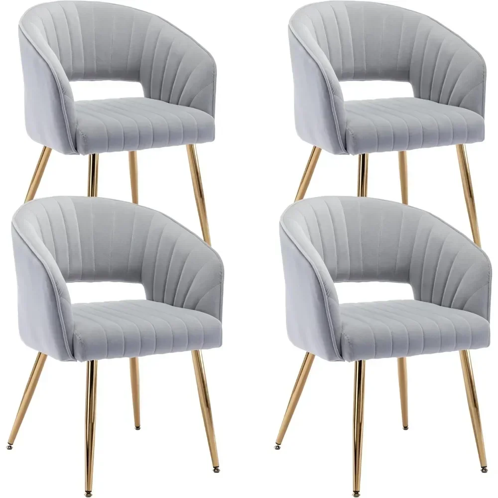 Modern soft velvet dining chair with hollow back and golden metal legs, perfectly decorating your dining table