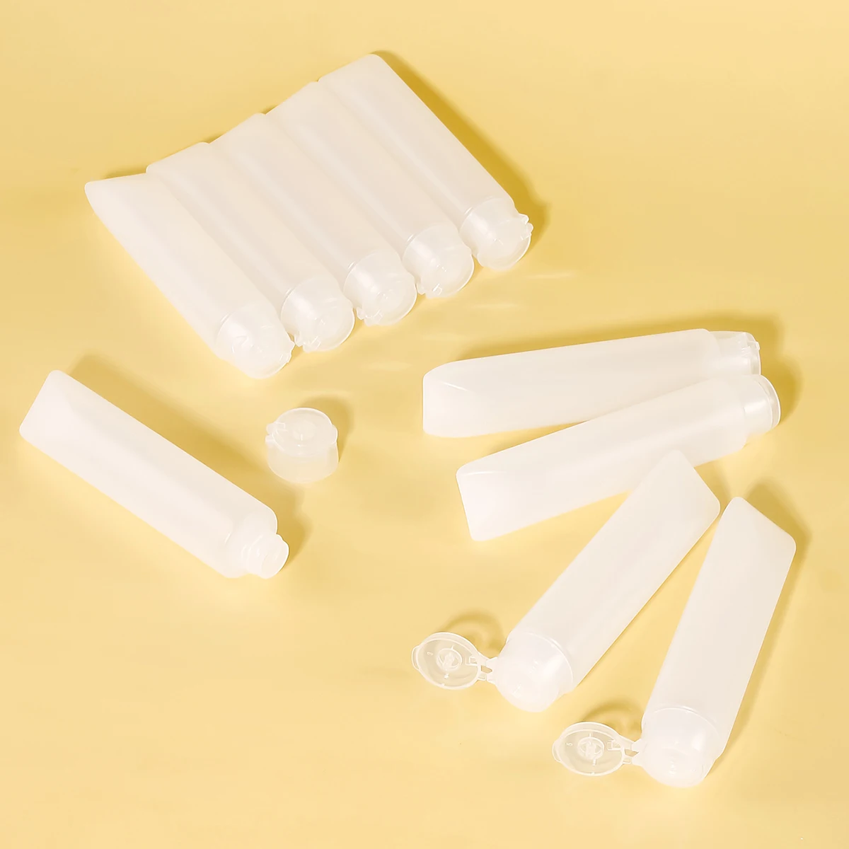 10pcs 30/50ml Empty Refillable Plastic Soft Travel Squeeze Tube Bottles Translucent Cosmetic Containers with Flip Cover