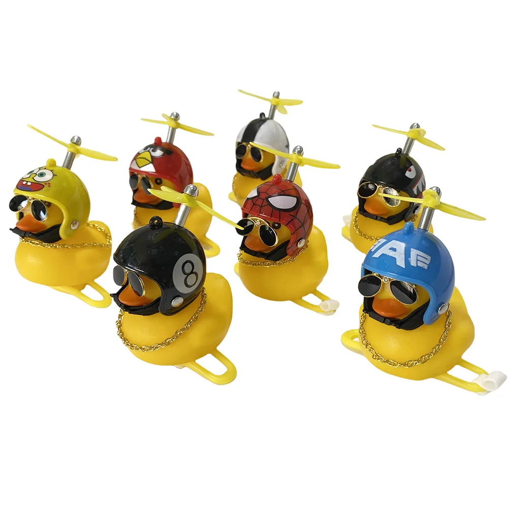 AliExpress NONE Rubber Broken Wind Duck Bike Motorcycle Car Ornaments Yellow Duck Car Dashboard Decoration with Cool Glasses Propeller Helmet