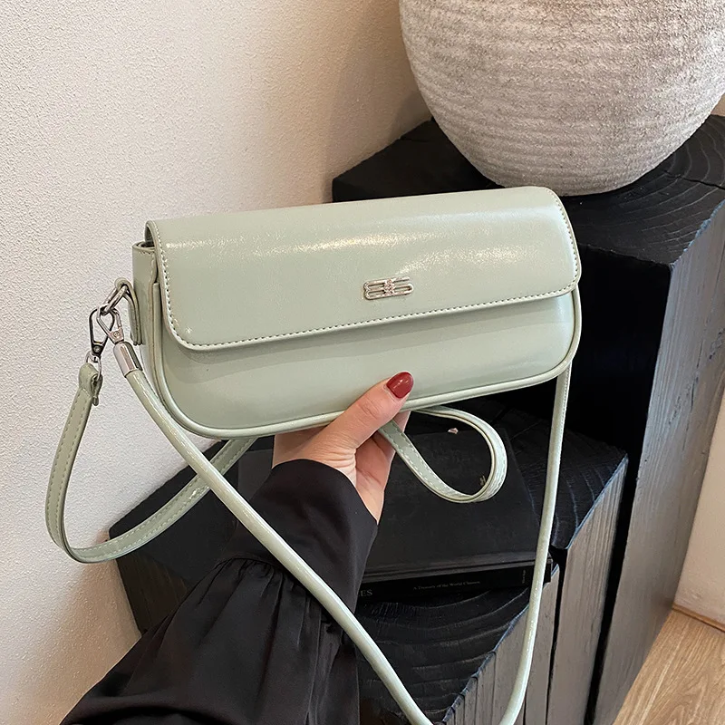 

‌2025 Minimalist Baguette Bag - Women's High-End One-Shoulder Messenger | Solid Color Chameleon Leather + Convertible Strap‌