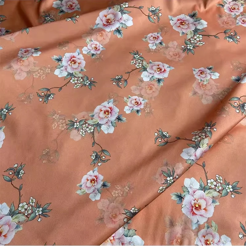 

Шелковая ткань Charmeuse 19 момме, 90% тутовый шелк, 10% спандекс, с оранжевым цветочным принтом, ширина 140 см (55 дюймов), 1 метр, XY059