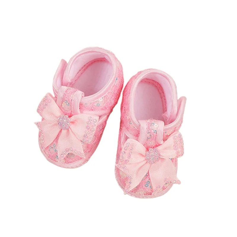 Mocasines para bebés y niñas, bonitos zapatos planos de suela suave con lazo y lentejuelas, zapatos antideslizantes para primeros pasos