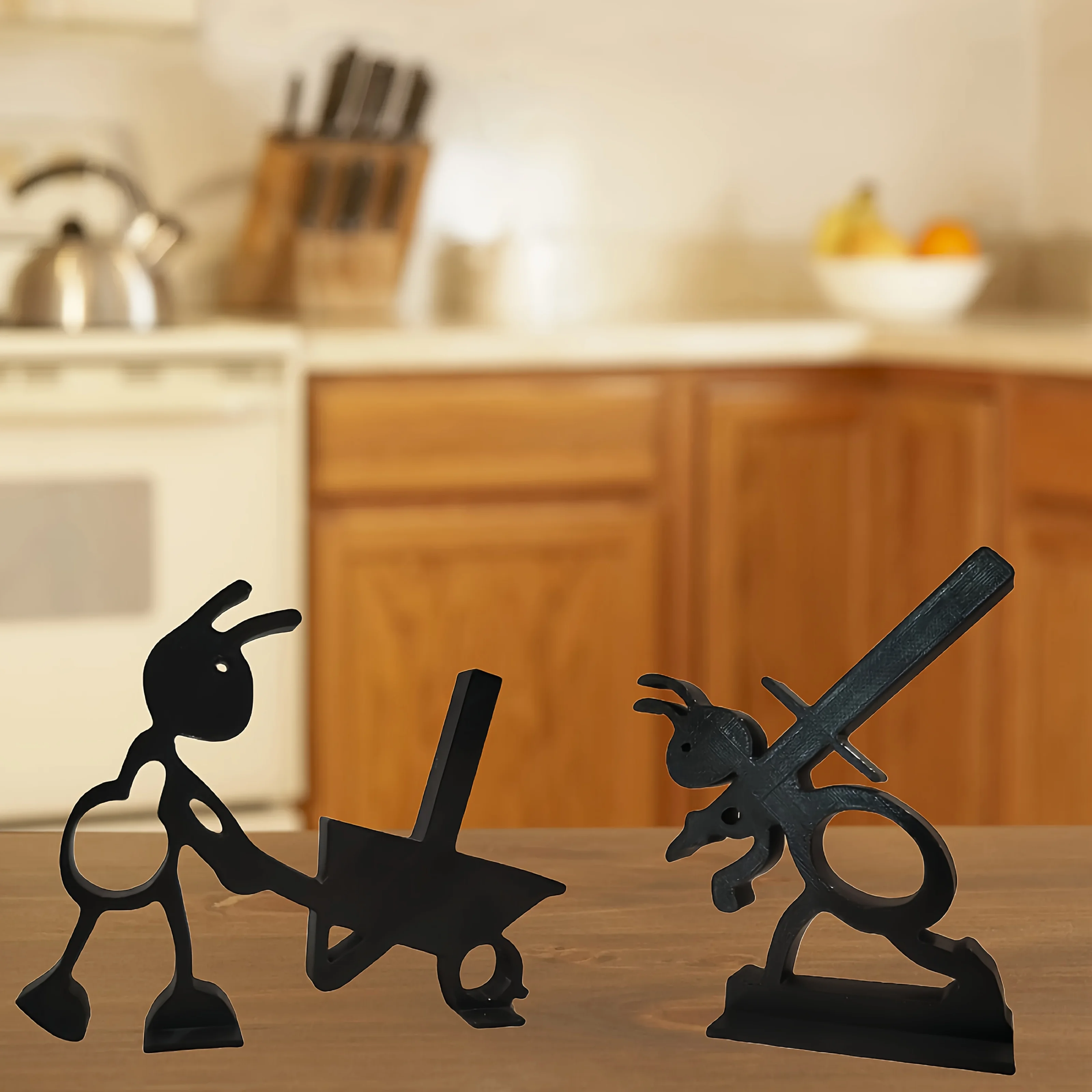 

2 black ant-shaped tissue holders with widened bases - heavy-duty design for stability, cute insect-themed decoration with