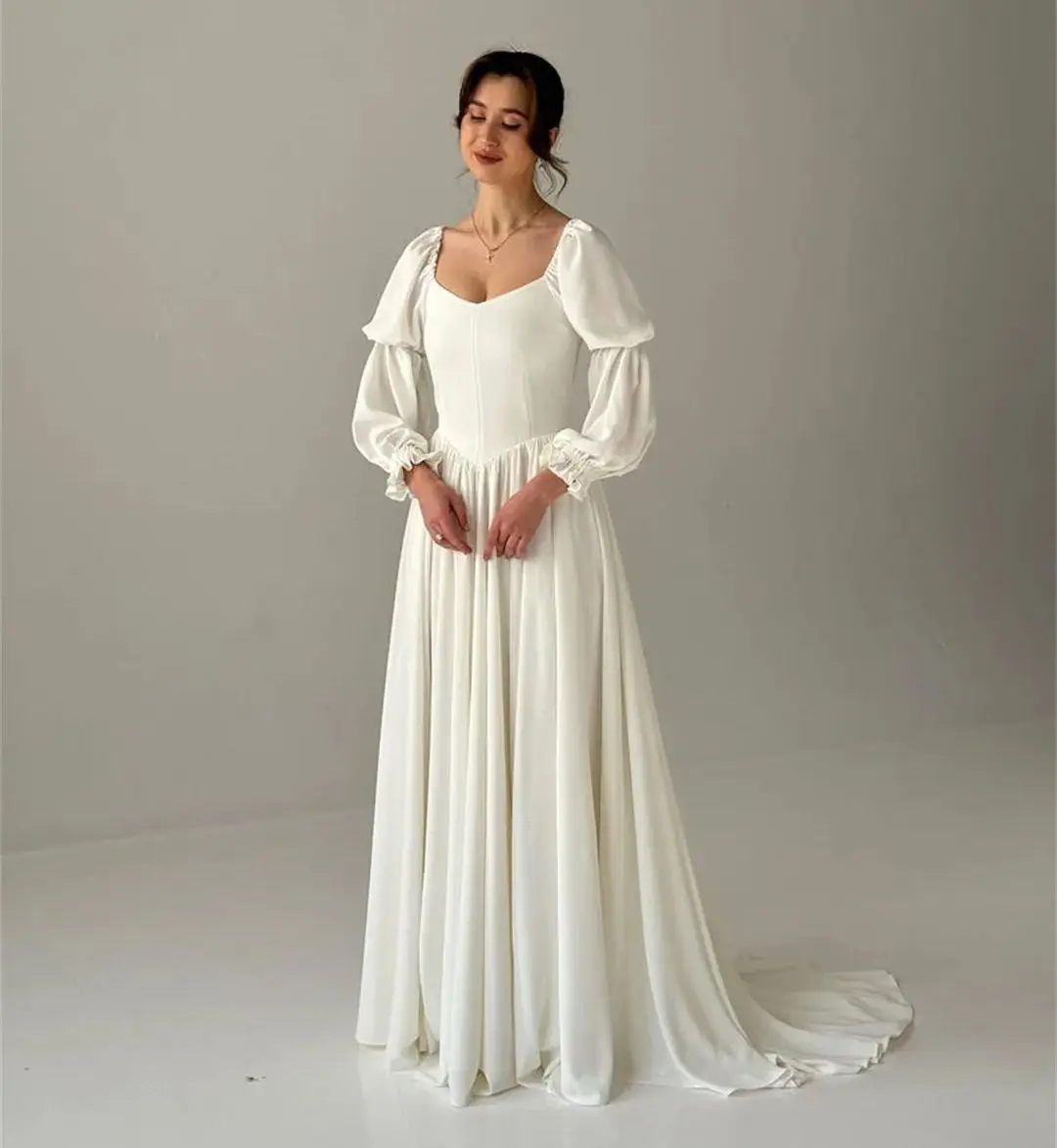 فساتين سهرة عادية على الطراز اليوناني بأكمام فانوس بسيطة وخصر باسك وكشكشة فستان زفاف أنيق برباط حتى رداء حفلات رسمي