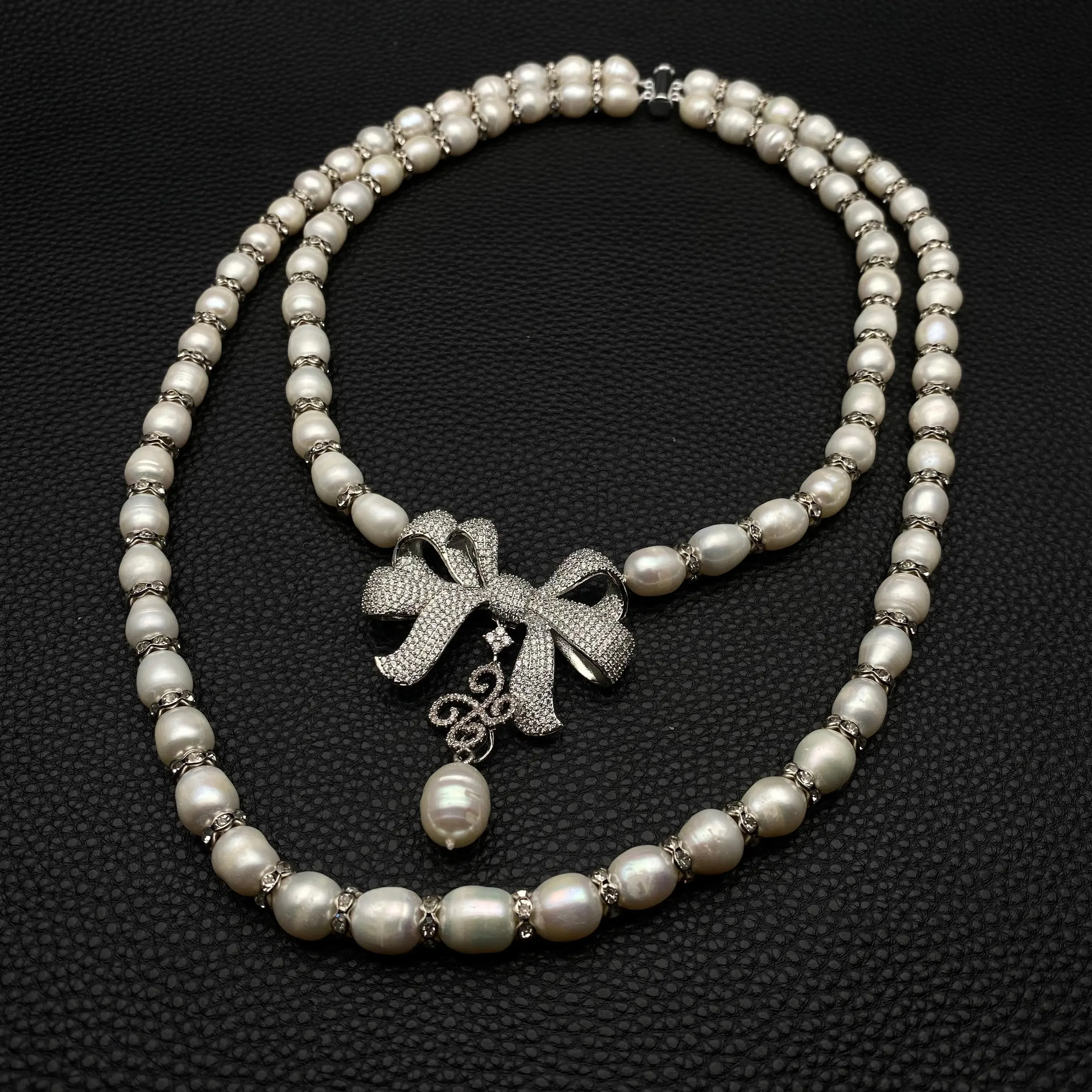 

2 Rows Freshwater Cultured White Rice Pearl Necklace Bowknot Cubic Zirconia Pave Pendant 18"