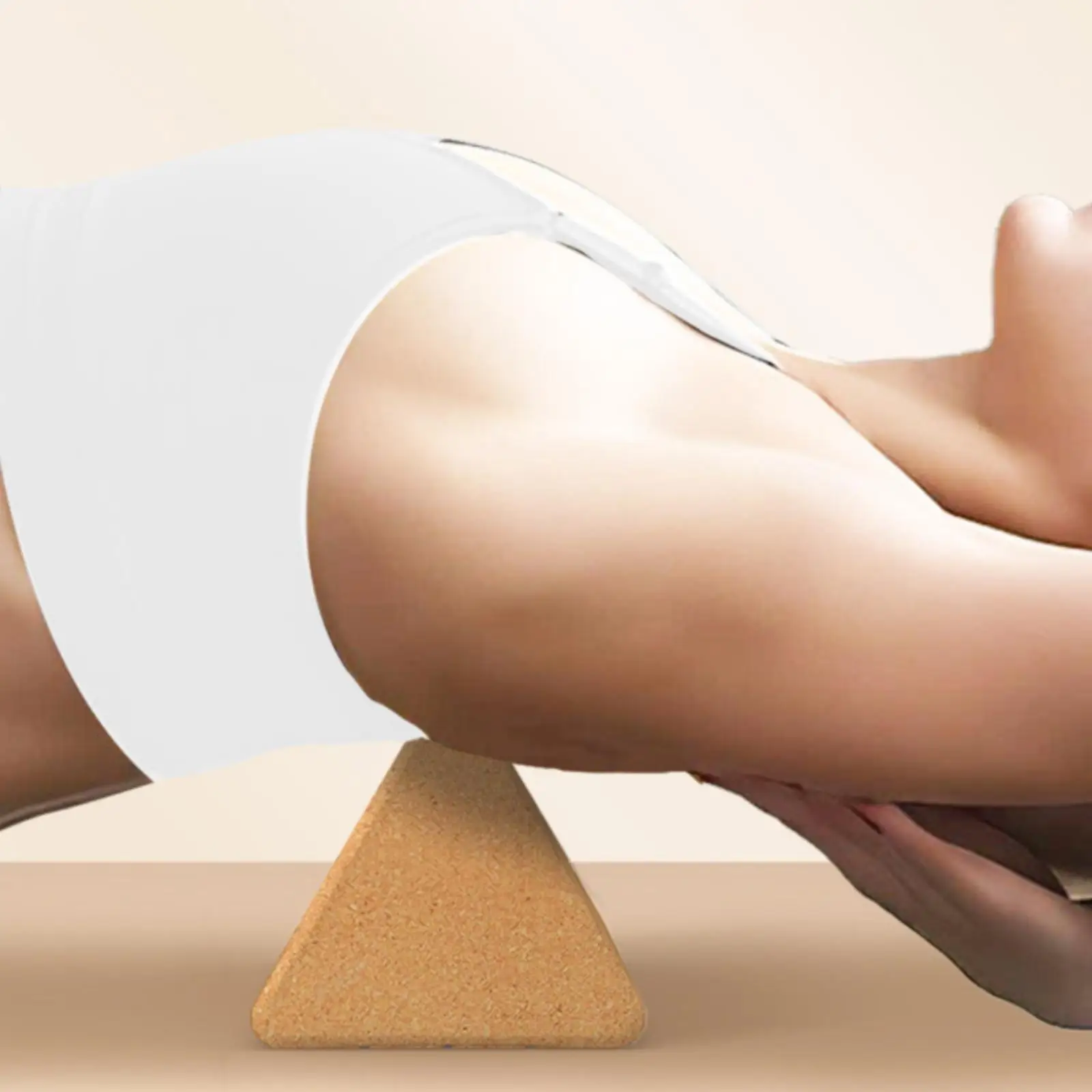 Triangular stretching block with angled cork wedge for yogis,