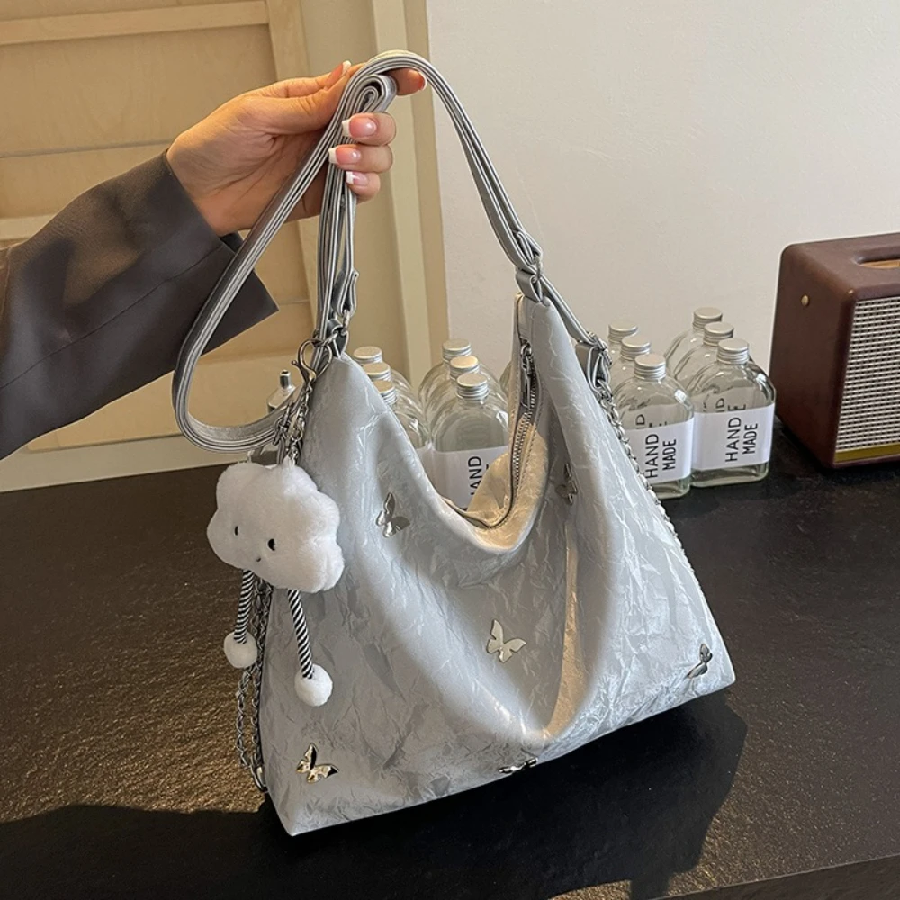 

Large-capacity women's bags new senior sense of commuting two shoulders shoulder crossbody bag to send Muppets