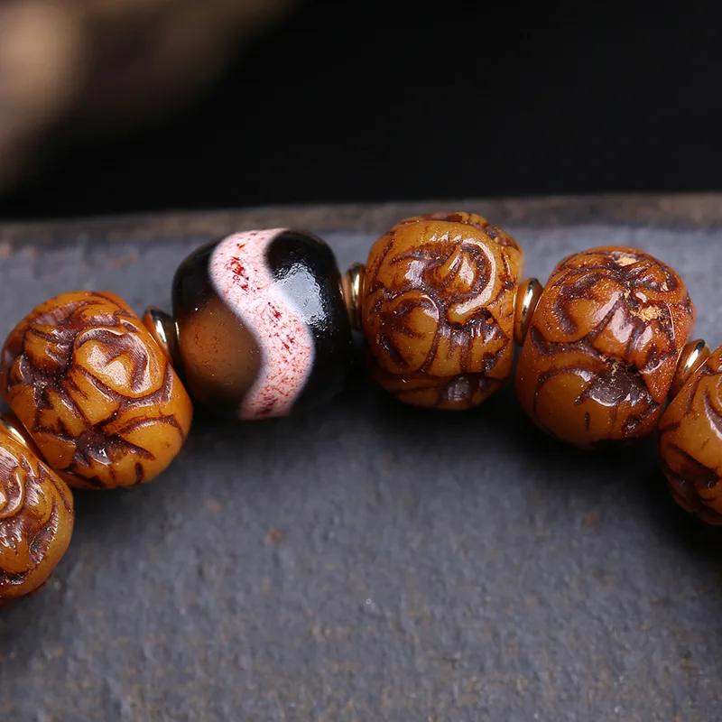 Tibetan-Style Yak Bone Carving, Featuring Elephant Deity Motifs, A Single-Strand Bracelet, Agate Beads, And A Set Of Mani Be