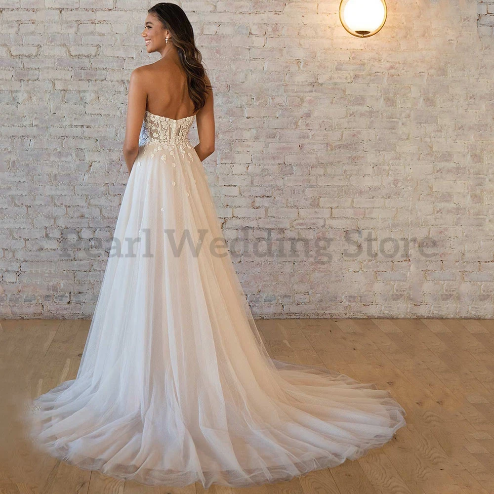 Classic Strapless Trouwjurk Mouwloze Backless Sweetheart Hals Applicaties Tulle Side Slit Floor Lengte A-lijn Bruidsjurken