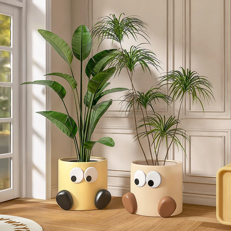 

ceramic floor-to-ceiling vase TV cabinet next to potted plant large simulation green plant creative flower pot